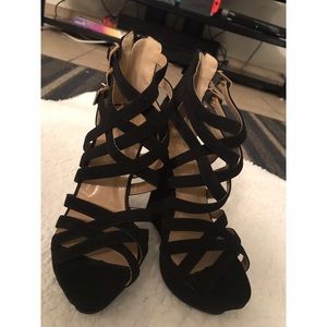 Black strapped wedge heels